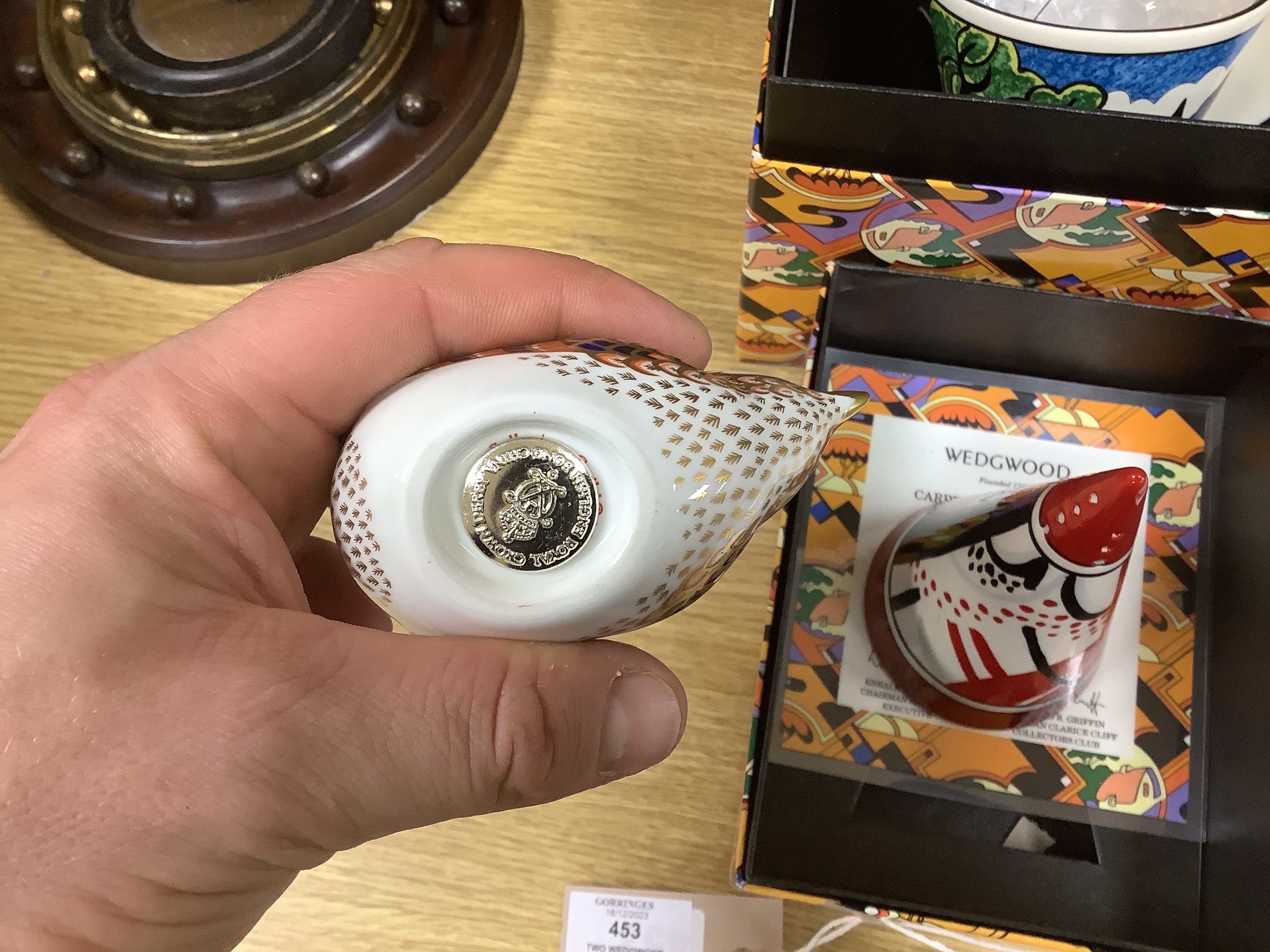A collection of five Royal Crown Derby animal and bird paperweights